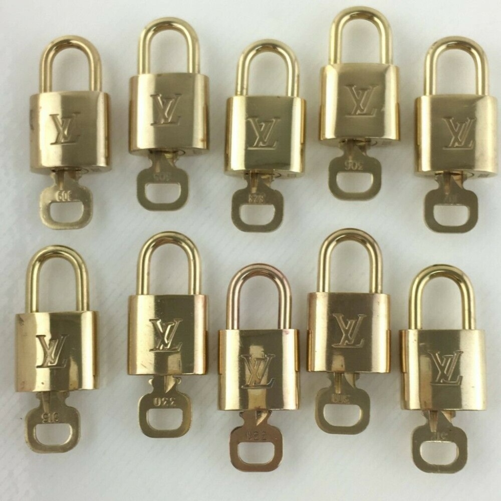 Authentic Louis Vuitton Pad Lock with key set